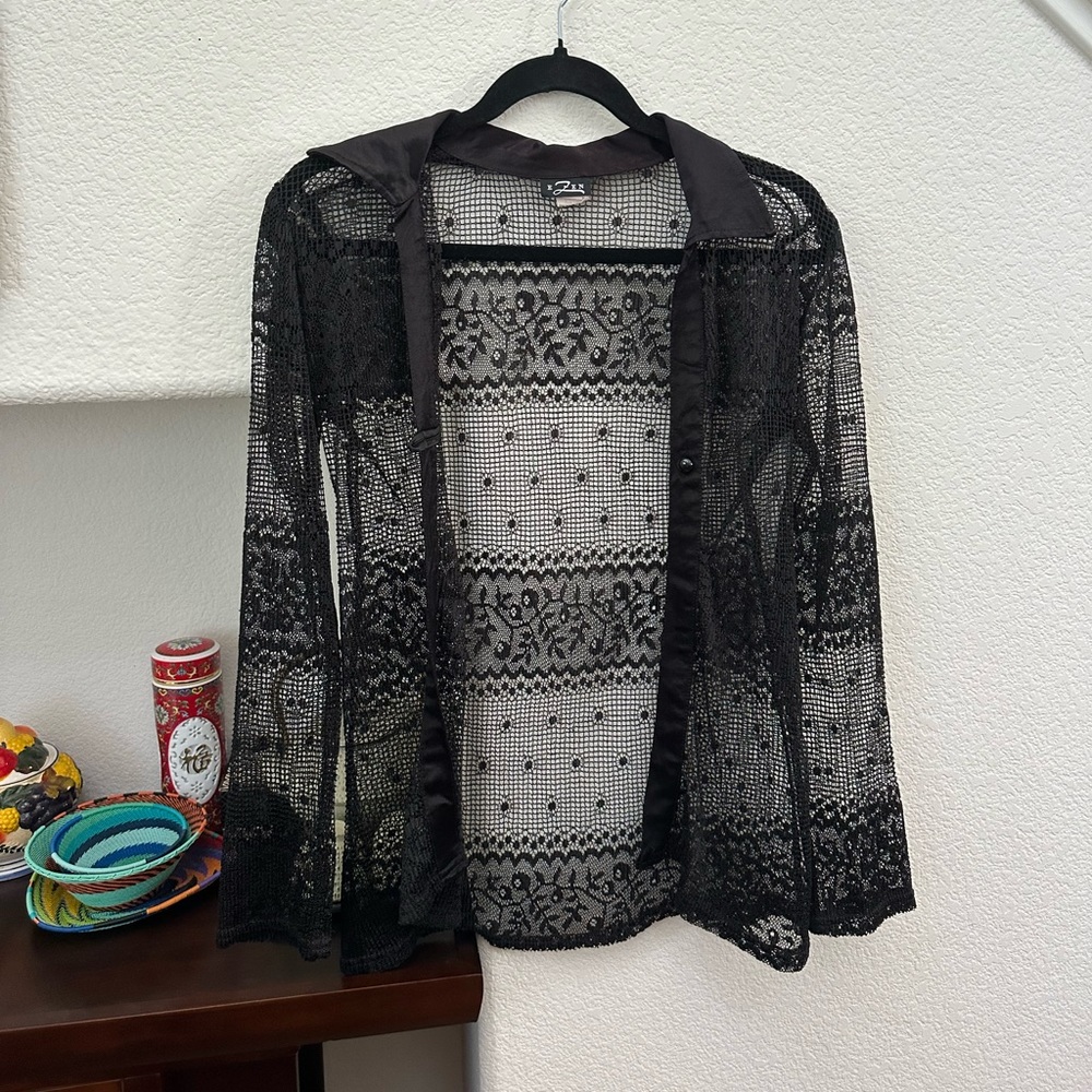 black collared crochet patterned type top